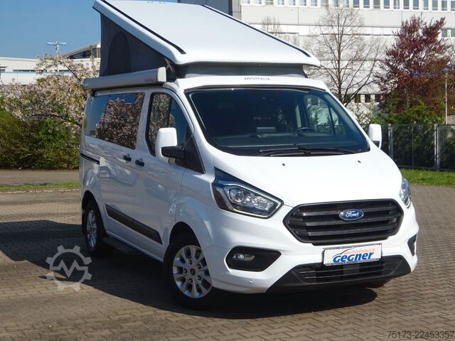 Húsbíll FORD Nugget 185PS Autm. Aufstelldach Markise AHK Navi