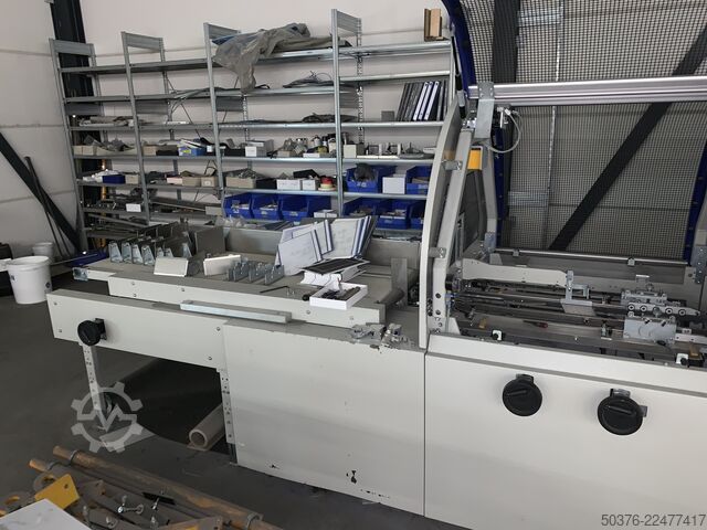 Linha de processamento totalmente automatizada para caixas de cartão rígido até 400 ciclos/hora Kolbus fully equiped BoxLine SW series
