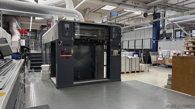 מכונת הדפסה של דפי קיזוז Man Roland R 707 LTTLV UV Evolution + Mabeg RS 104