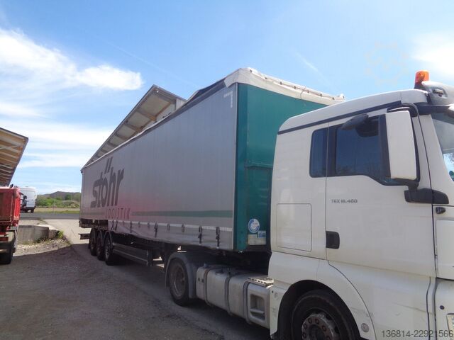 Open semitrailer with tarp  SAPL 24 LTN 385/65 R 22,5