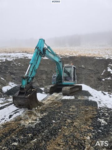 гусеничний екскаватор Kobelco SK135 SR LC tracked excavator with digging bucket