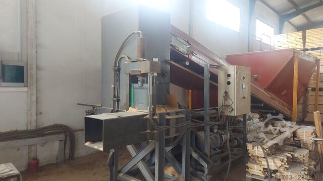 SAWDUST COMPACTOR AND BAGGING MACHINE 