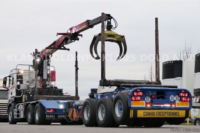 Kamion për transport druri MAN TGS 33.500 Holztransport Kran Langholznachläufer