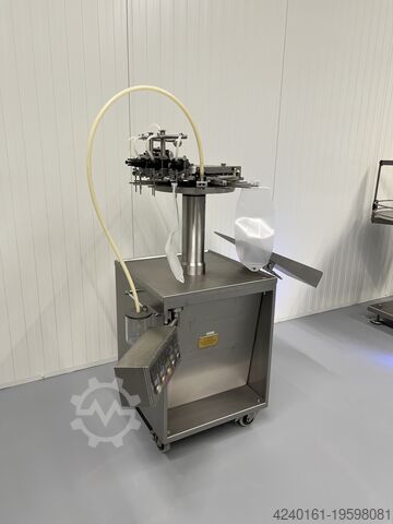 Maszyna do napełniania i zamykania worków H. Jouhsen Bag filling and sealing machine