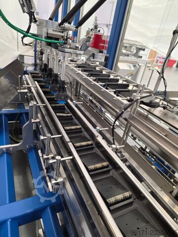 Kartonnen verpakkingsmachine 1 Optima CMF Kartonierer 1