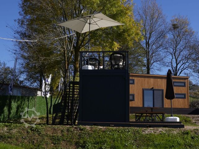 Contêiner residencial Wolf Tiny Caffe Container mit Terasse