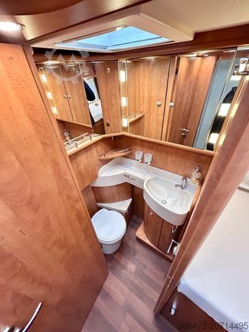 Camper integrado CARTHAGO Chic C-Line I 4.9 *Einzelbetten-Hubbett*