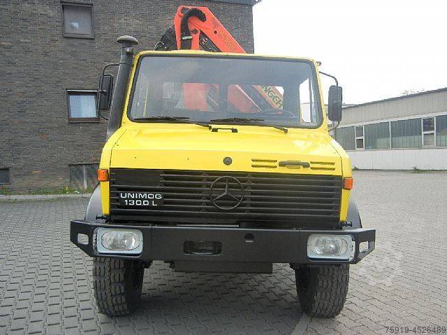 Other Mercedes-Benz UNIMOG 1300L mit großem Kran + Funkfernsteuerung