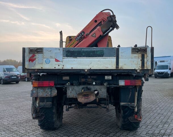 Kuorma-autoon asennettu nosturi UNIMOG U 5000 Doka Pritsche/ PK 10.502 A/ AC/ AHK/ EU 3