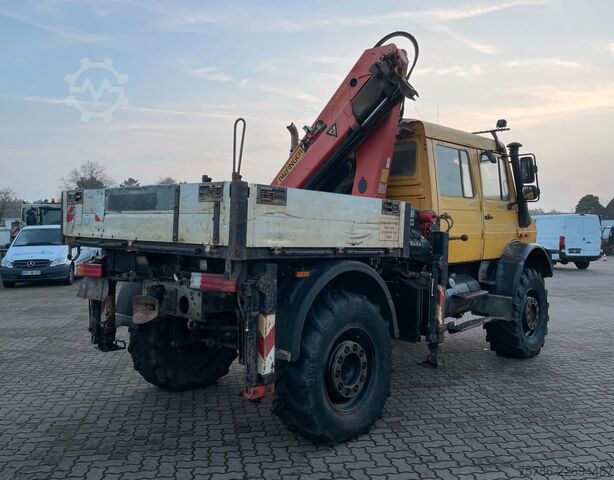 Kuorma-autoon asennettu nosturi UNIMOG U 5000 Doka Pritsche/ PK 10.502 A/ AC/ AHK/ EU 3