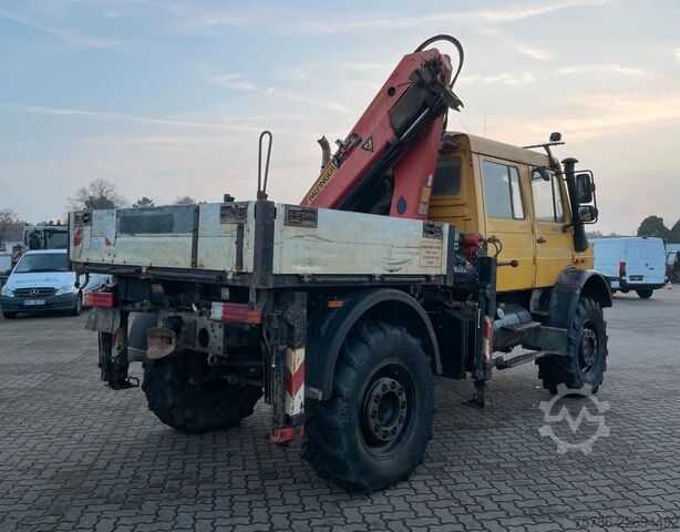 Avolava kuorma-auto UNIMOG U 5000 Doka Pritsche/ PK 10.502 A/ AC/ AHK/ EU 3