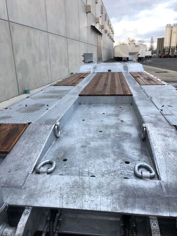 Нископроходен ремарке Möslein T 4 VB H1  neuer 4 Achs Tieflader hydraulischen Rampen