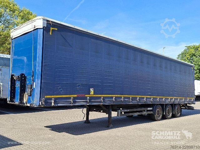 Avoin puoliperävaunu pressulla Kögel Curtainsider Mega