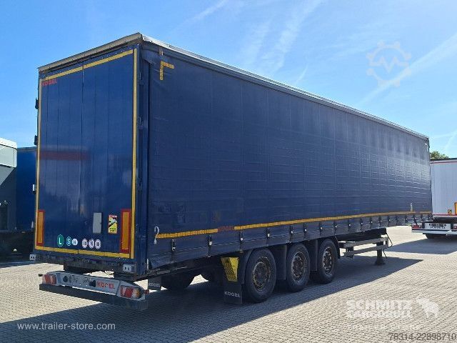 Avoin puoliperävaunu pressulla Kögel Curtainsider Mega