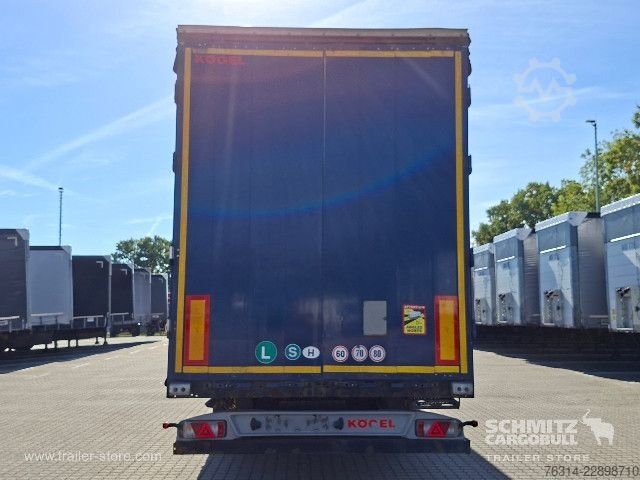 Avoin puoliperävaunu pressulla Kögel Curtainsider Mega