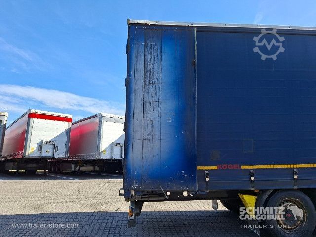 Avoin puoliperävaunu pressulla Kögel Curtainsider Mega