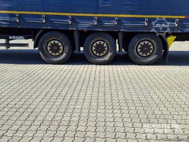 Avoin puoliperävaunu pressulla Kögel Curtainsider Mega