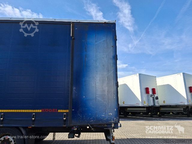 Avoin puoliperävaunu pressulla Kögel Curtainsider Mega