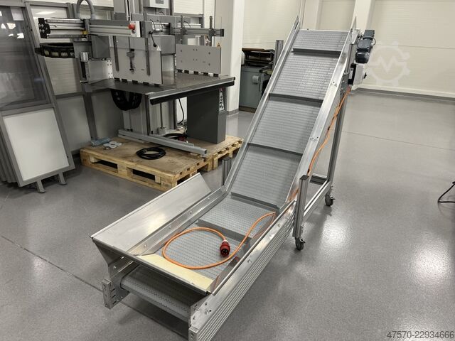 Máy bế khuôn Conveyor belt for waste removal from guillotine, three-knife trimmer