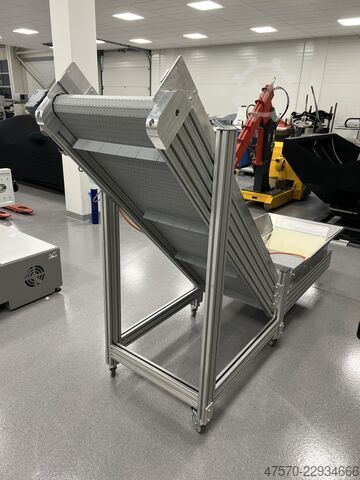 Máy bế khuôn Conveyor belt for waste removal from guillotine, three-knife trimmer