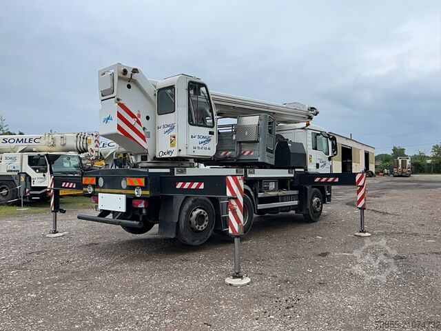 Nền tảng làm việc trên không gắn trên xe tải MAN TGS 26.320 6x2-2 BL with Oil Steel Eagle 3526 (35m)