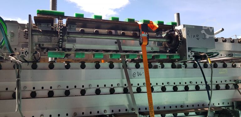 Transportador de rolos com empurrador de corrente Transnorm 90° 9900-600-550
