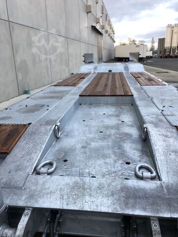 Remolque de plataforma baja Möslein T 4 VB H1  neuer 4 Achs Tieflader hydraulischen Rampen