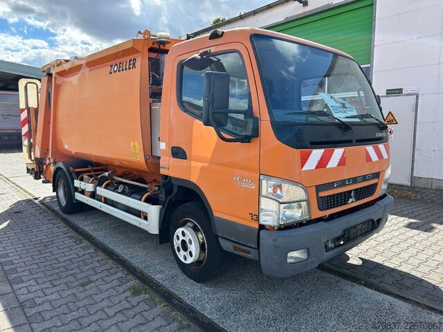 ごみ収集車 MITSUBISHI FE Cante 7C18 / Zöller Micro XL 7 + Schüttung