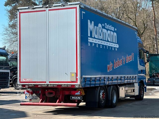 Camión plataforma con toldo MAN TGX 26.440 6x2 BL Plane & Retarder /EDSCHA