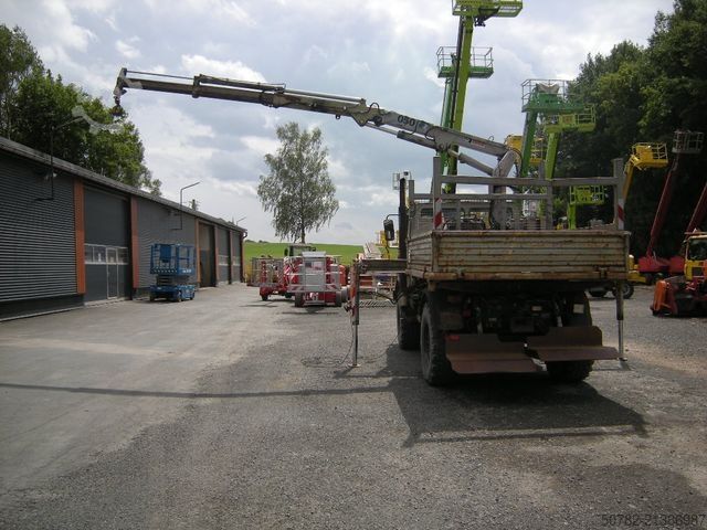 三向翻斗货车 UNIMOG Unimog U1250 mit Kran