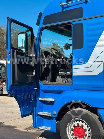 Flatbed truck with tarp MAN TGX 26.440