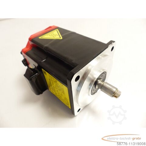 Fanuc motor Fanuc A06B-2218-B000 # 0100 Motor + A860-2050-T321 SN C164F0ED5 - ! -
