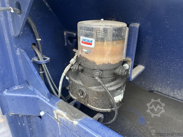 Screw press Husmann with container. screw press for wood, screw press for waste, stationary press Husmann HSP-E-N-V