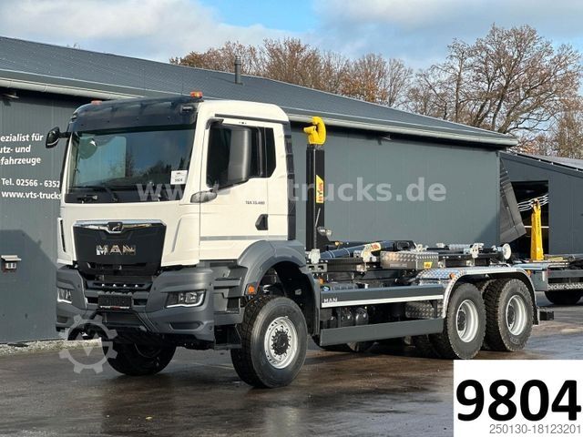 Kamion me krah të lëvizshëm për kontejnerë MAN TGS 33.480 6x6 BL HYVA-Abrollkipper *NEU*