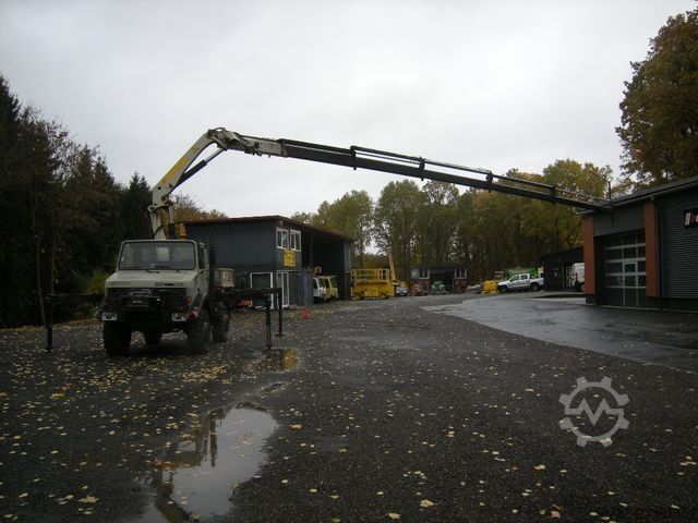 ফ্ল্যাটবেড ট্রাক MERCEDES-BENZ Unimog U2100 mit Kran Palfinger PK14500D