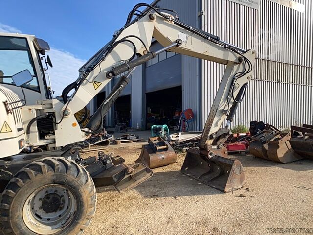 Wheeled Excavator Terex TW110 with two-piece offset boom and 3 buckets