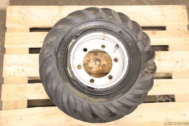 Tire with rim Deestone 26x12.0-12 NHS