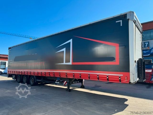 Open semitrailer with tarp KÖGEL S24-1 *  * SAF-ACHSEN * VOLUMEN *ÜBERBREITE