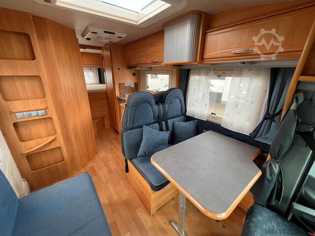 Daļēji integrēta kemperis ADRIA 670 SP - Festbett - Garage - 2 x Klima