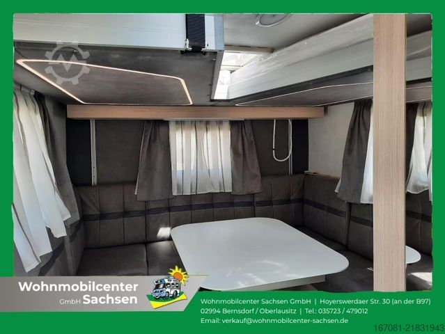 अर्ध-संयोजित कैम्पर ILUSION XMK 590 FFH Premium Tageszulassung
