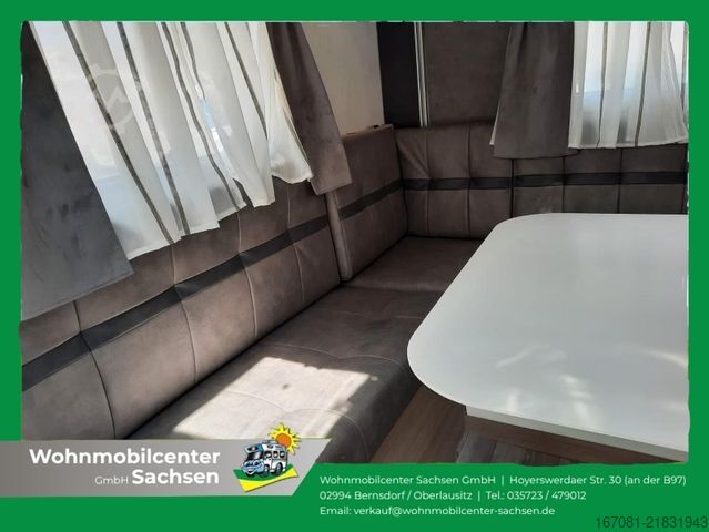 अर्ध-संयोजित कैम्पर ILUSION XMK 590 FFH Premium Tageszulassung