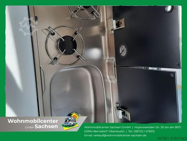 अर्ध-संयोजित कैम्पर ILUSION XMK 590 FFH Premium Tageszulassung