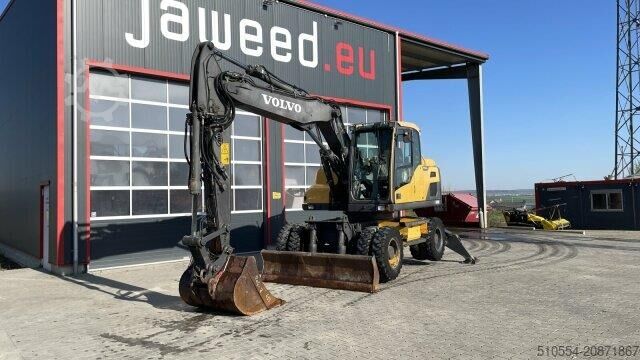 Radbagger Volvo EW 140 D / Schild / 2x Patzen / Schnellwechsler