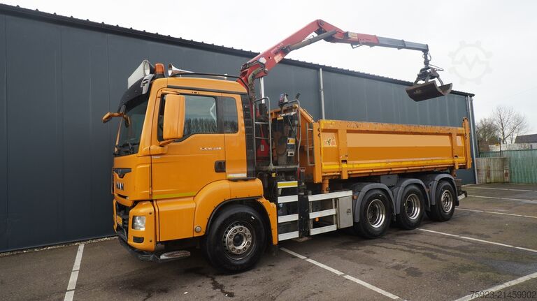 شاحنة رافعة MAN TGS 35.440 8X4 2 SIDE TIPPER WITH HMF Z 1943 CR...