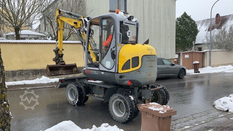 Bager na kotačima Wacker Neuson 6503 with 3 excavator buckets