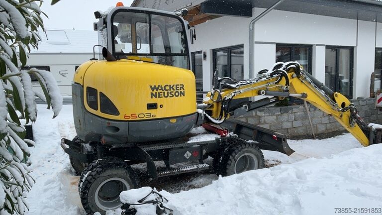 Bager na kotačima Wacker Neuson 6503 with 3 excavator buckets