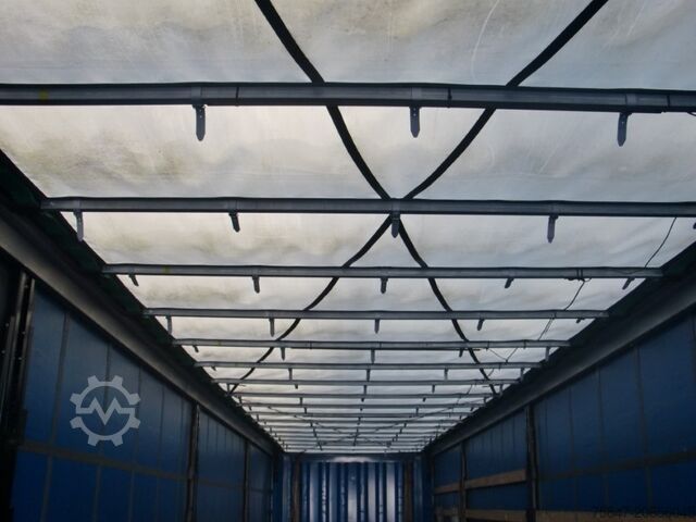 Semi treler dengan katil rata & terpal Krone SDP 27 Coil 8.600 bahnverladbar