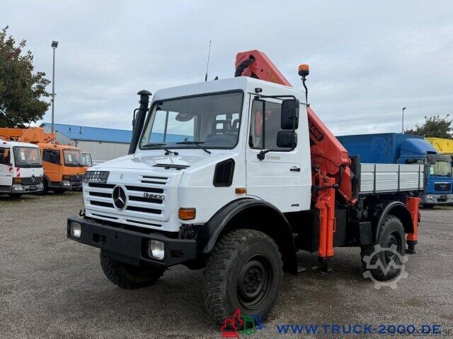 Tovornjak s ploščadjo Unimog U4000 4x4 Palfinger Kran PK10501 Hakenhöhe 11,5M