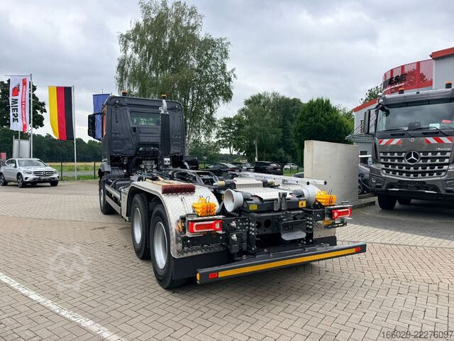 Camión portacontenedores de gancho MERCEDES-BENZ Arocs 2848 6x4 Abrollkipper Meiler RS21.65