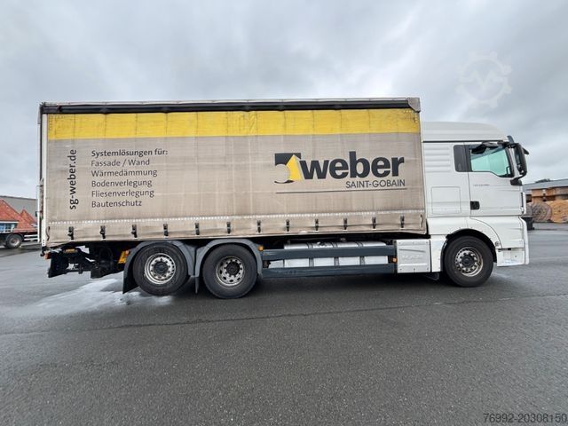 Tovorno vozilo s ravno platformo in ponjavo MAN TGX 26.480 mit Ladebordwand